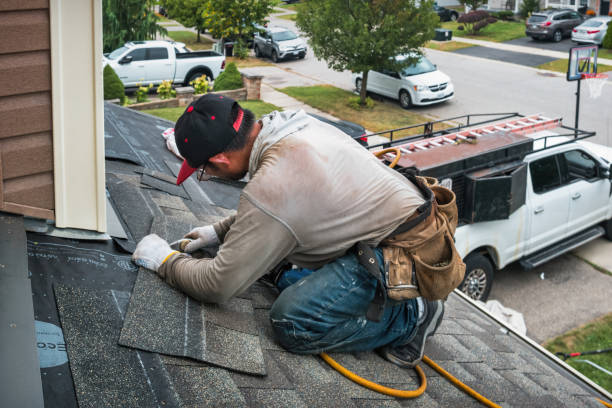 Professional Gutter Installation technician working in Hamilton, MI
